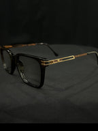 OPTICA Jerry shiny black cateye frames with gold side rods and 3D finish. Medium size.
