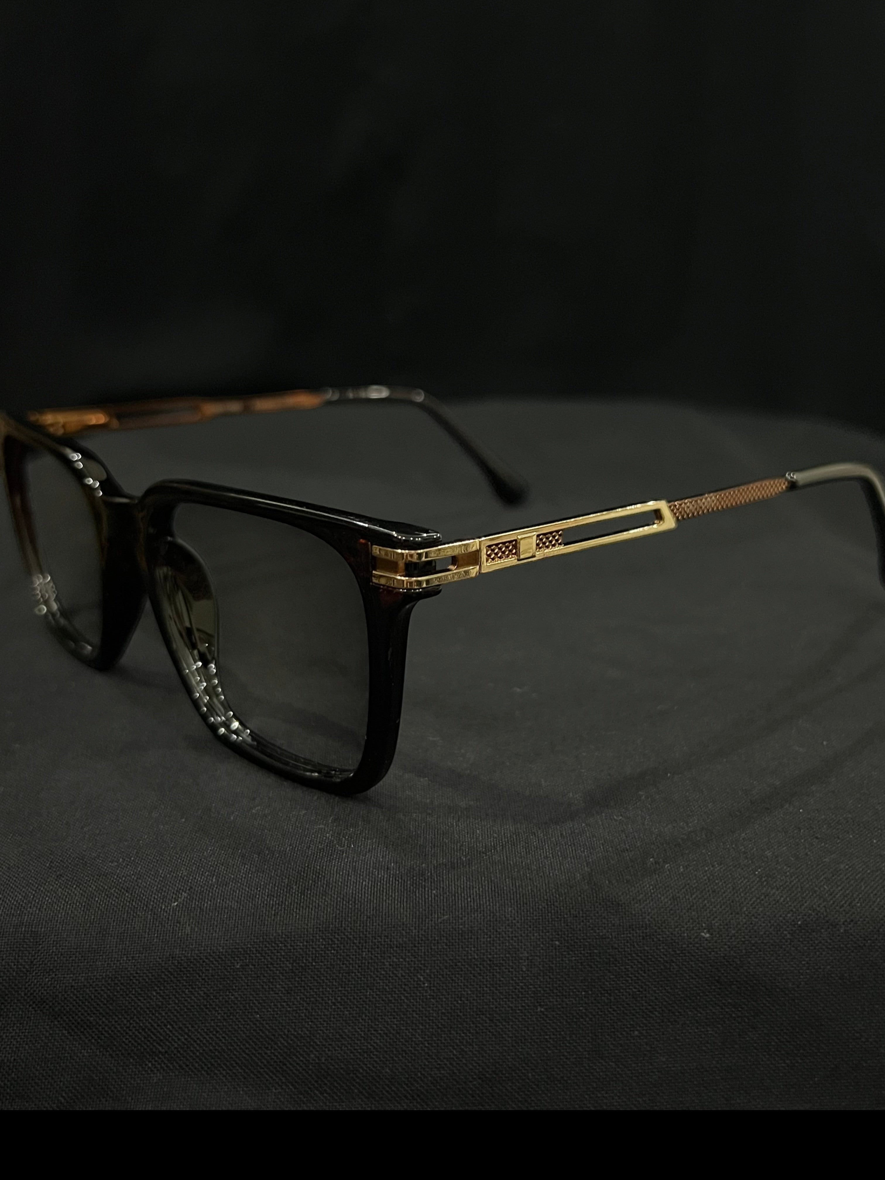 OPTICA Jerry shiny black cateye frames with gold side rods and 3D finish. Medium size.