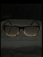 OPTICA Jerry shiny black rectangular frames with gold accents and gradient lenses. Medium size.