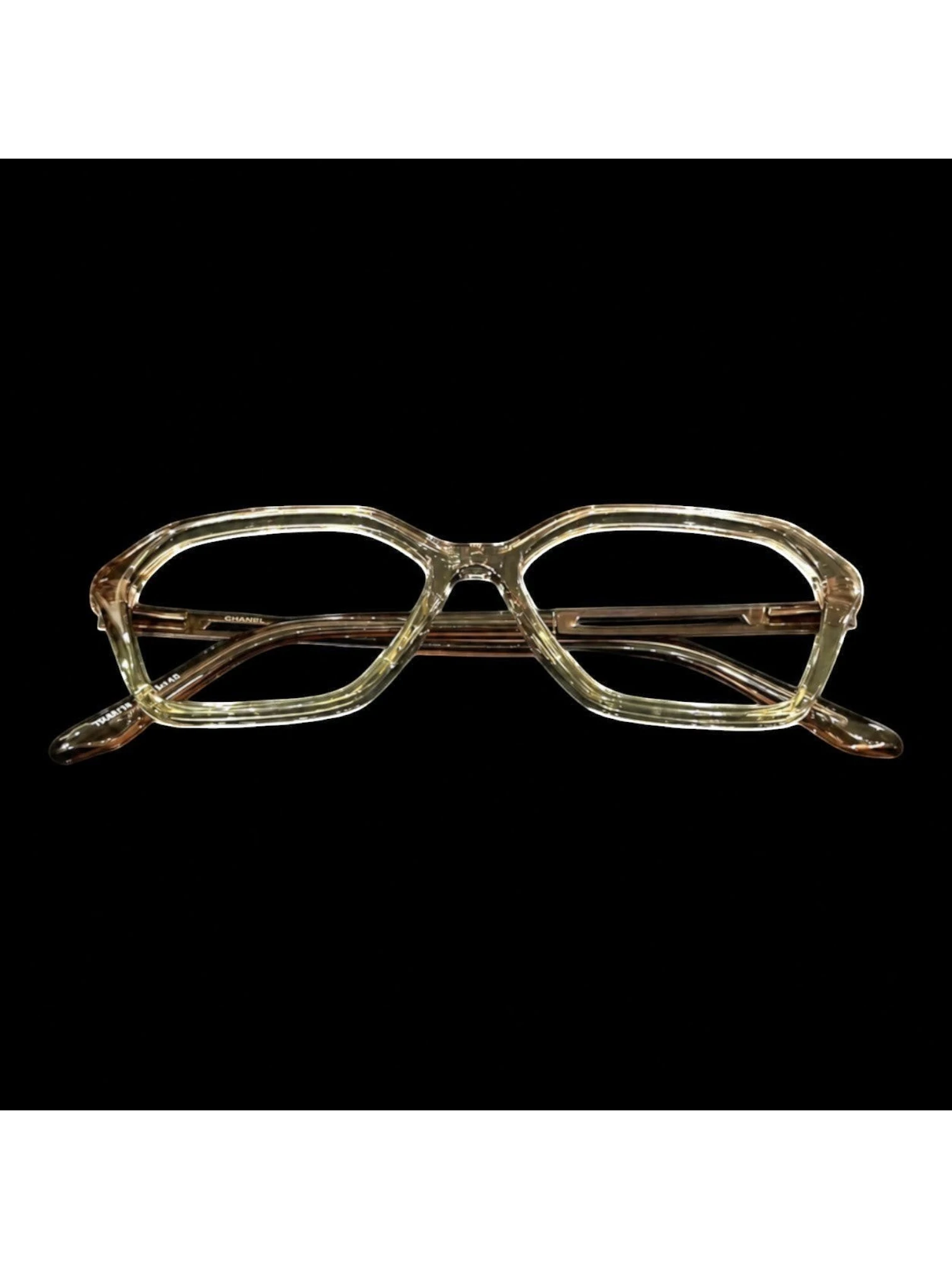 OPTICA sculpted vintage tortoise shell acetate eyeglasses with a 3D texture. Clear amber frames.