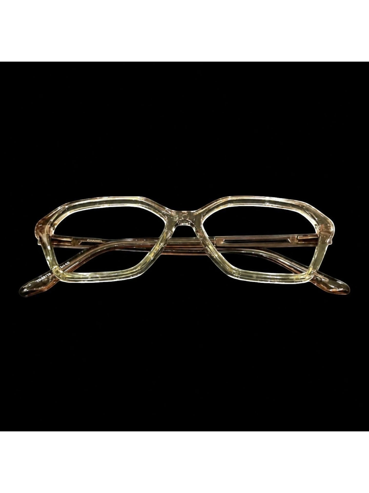 OPTICA sculpted vintage tortoise shell acetate eyeglasses with 3D texture. Clear amber frames.