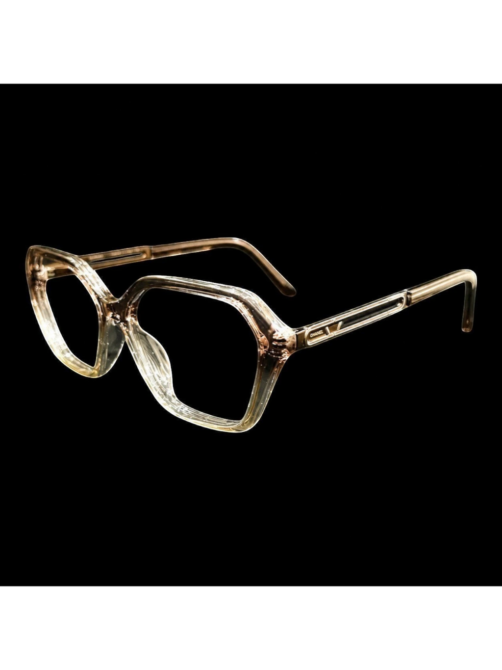 OPTICA sculpted vintage tortoise shell acetate frames with 3D texture for power glasses. Clear brown hue.