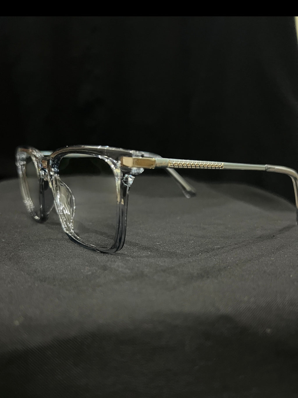 OPTICA IRIS translucent oversized rectangle eyeglasses with thick borders and gold temple accents.